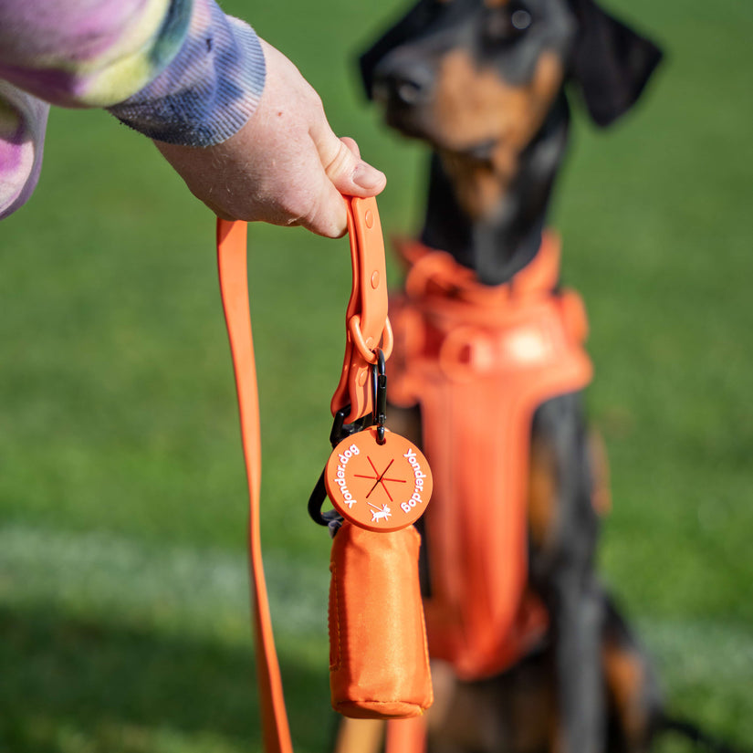 peach waterproof dog lead & poop bag holder